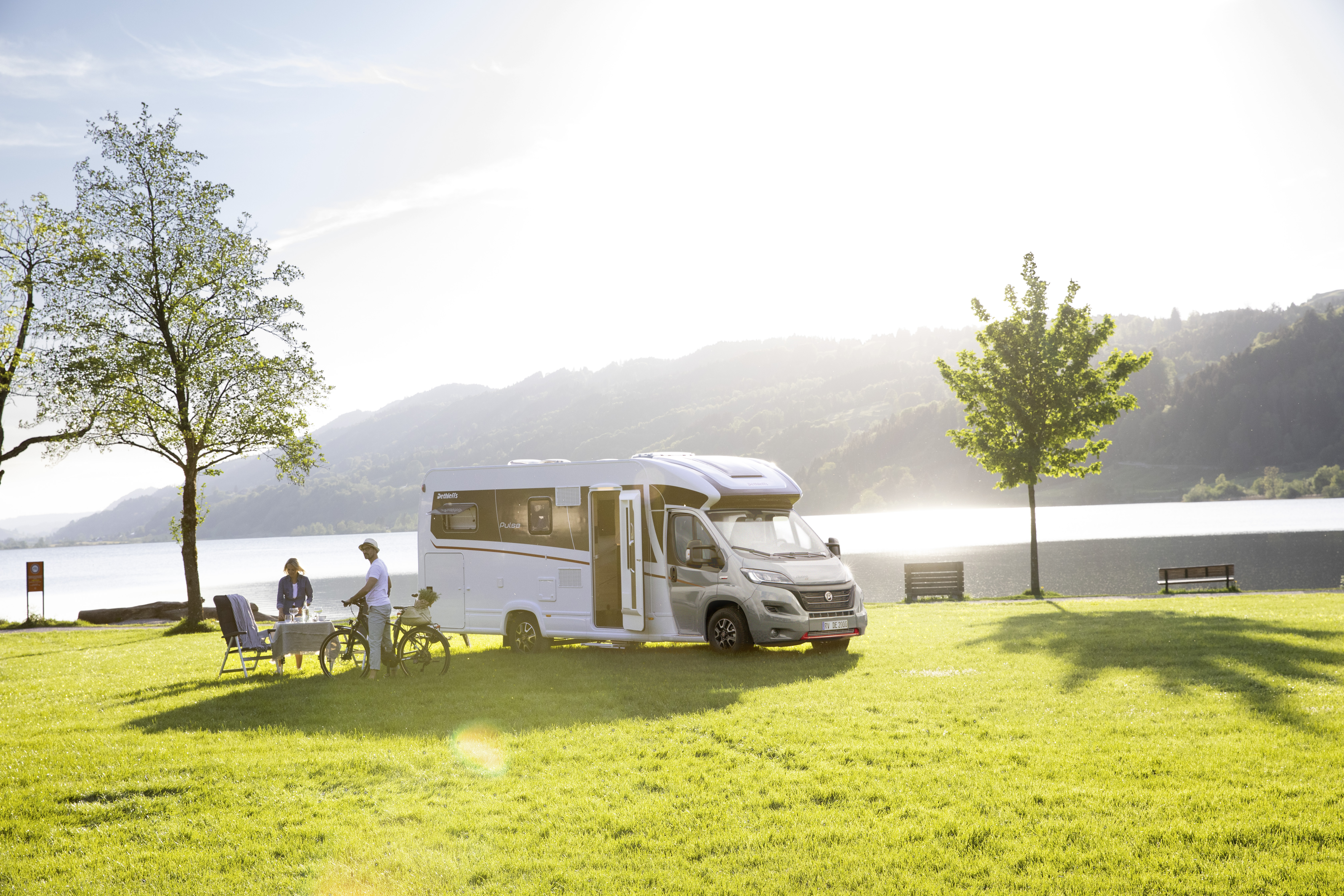 A rented motorhome parked by the stunning Lake Constance near Kressbronn